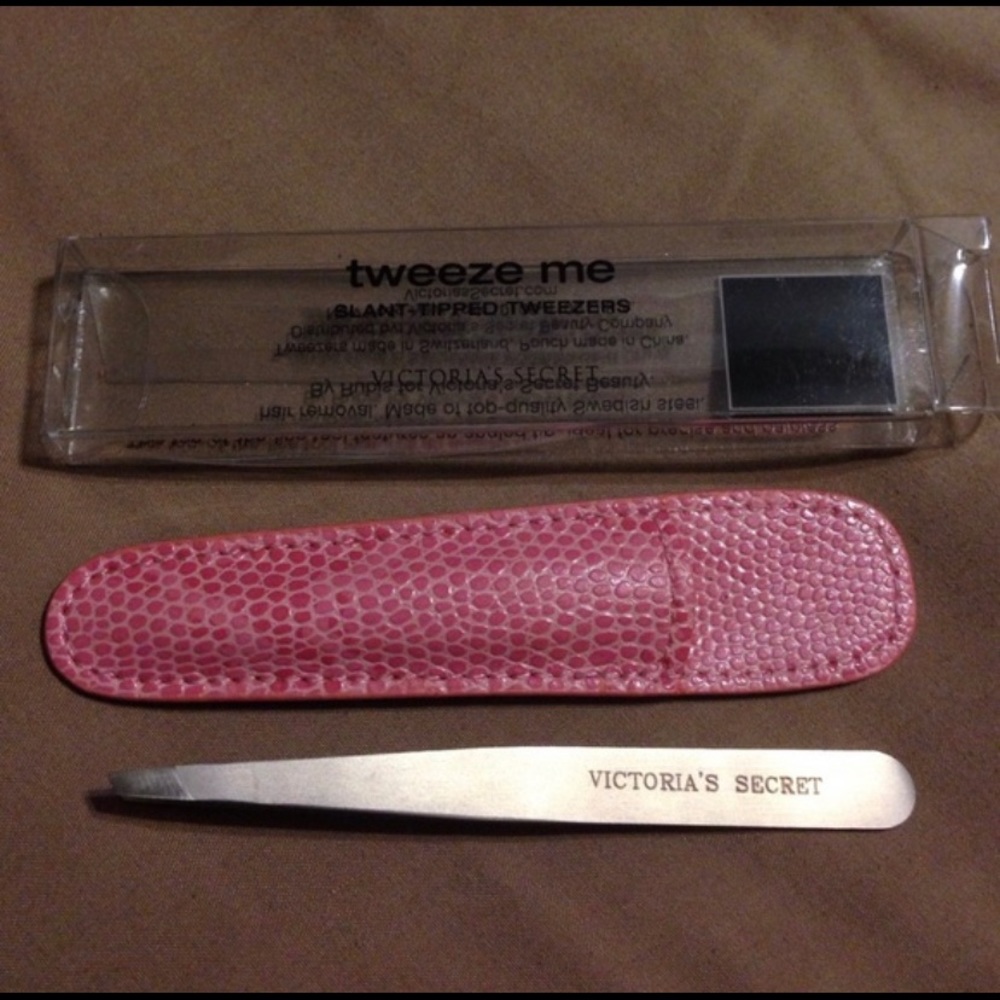 Victoria’s Secret silver tweezers, brand new.
